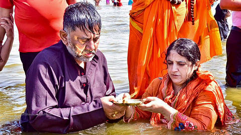 Karnataka Dy CM DK Shivakumar along with his wife take a holy dip at the Sangam during the Mahakumbh Mela, in Uttar Pradeshs, Prayagraj.