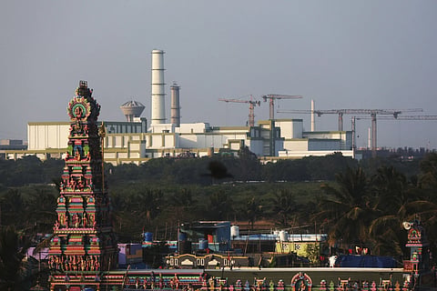 A temple stands in the foreground of the Madras Atomic Power Station located at Kalpakkam in Tamil Nadu, Monday, Feb 10, 2025.