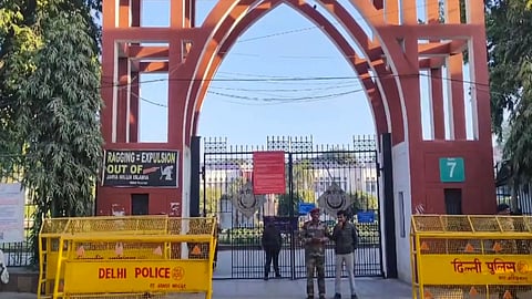 Security personnel deployed outside the Jamia Millia Islamia University in view of students' protest in New Delhi, Wednesday, Feb. 13, 2025.