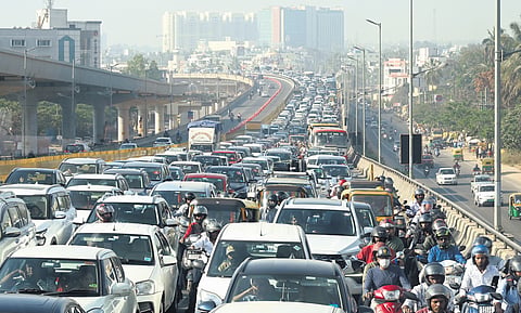 Massive traffic on the fourth day of Aero India 2025 on Ballari Road leading to Kempegowda International Airport. Several people who had purchased tickets to watch the air show missed the event.