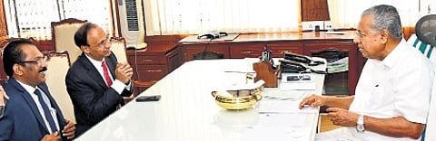 Federal Bank MD & CEO K V S Manian meets CM Pinarayi Vijayan. Bank’s senior vice-president, Shiju K V, is also seen