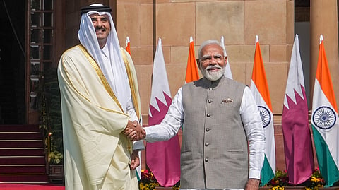 Prime Minister Narendra Modi and Amir of Qatar Sheikh Tamim Bin Hamad Al Thani prior to a meeting, at the Hyderabad House in New Delhi, Tuesday, Feb. 18, 2025.