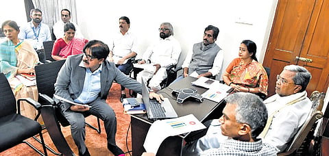 Chief Minister Siddaramaiah, ministers Krishna Byre Gowda, Eshwar Khandre, Rahim Khan, and Byrathi Suresh, and Chief Secretary Shalini Rajaneesh and other officials participate in a meeting in Bengaluru on Tuesday