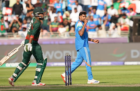 India's Harshit Rana celebrates the wicket of Bangladesh's Rishad Hossain during a One Day International (ODI) cricket match of the ICC Champions Trophy between India and Bangladesh, at Dubai International Cricket Stadium, in Dubai, UAE, Thursday, Feb. 20, 2025.