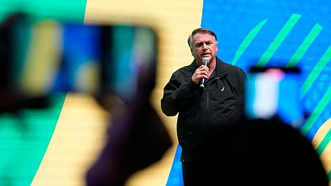 Brazil's former President Jair Bolsonaro addresses attendees of the Liberal Party's National Communication Meeting in Brasilia, Brazil, Thursday, Feb. 20, 2025.