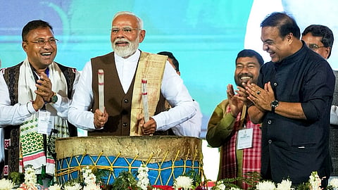 Prime Minister Narendra Modi with Assam Chief Minister Himanta Biswa Sarma attends mega tribal dance event 'Jhumoir Binandini', an attempt to set a world record for the largest participation in a Jhumoir dance programme, in Guwahati, Assam.