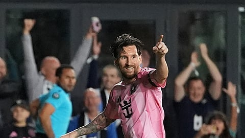 Inter Miami forward Lionel Messi celebrates scoring his side's first goal against Sporting Kansas City during the first half of a CONCACAF Champions Cup soccer match, Tuesday, Feb. 25, 2025, in Fort Lauderdale, Fla.