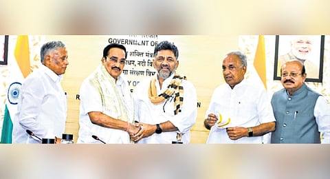 Deputy Chief Minister DK Shivakumar greets Jal Shakti Minister CR Patil
in New Delhi on Tuesday