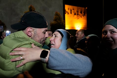 Palestinian prisoners are greeted after being released from Israeli prison following a ceasefire agreement between Israel and Hamas, in the West Bank city of Ramallah, Thursday, Feb. 27, 2025.