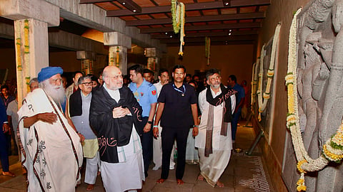 Deputy Chief Minister DK Shivakumar, Union Home Minister Amit Shah, Sadhguru Jaggi Vasudev and others at the Isha Yoga Centre in Coimbatore on Mahashivaratri on Wednesday evening