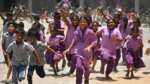 Students in joyful mood while they leave school premises on the last day as the summer holidays were given in Vijayawada on Tuesday.