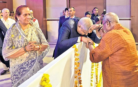 Vice-President Jagdeep Dhankhar seeks blessings of BJP veteran O Rajagopal at the fourth P Parameswaran Memorial Lecture organised by Bharatheeya Vichara Kendram in Thiruvananthapuram on Sunday