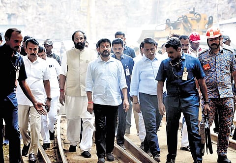 Chief Minister A Revanth Reddy and Irrigation Minister Uttam Kumar Reddy visit the SLBC tunnel collapse site in Nagarkurnool district on Sunday.