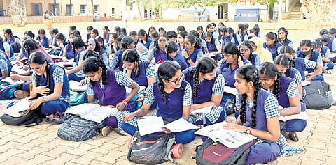 Students of Presidency Girls Higher Secondary School in Egmore in Chennai doing last-minute preparations ahead of the Tamil exam on Monday