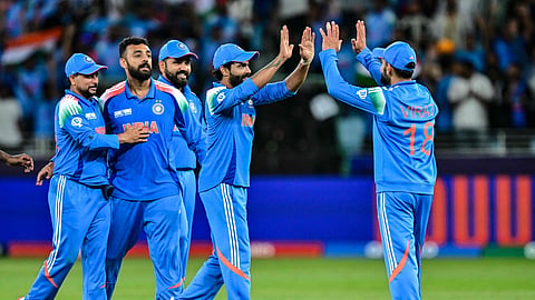 India players celebrate a wicket against New Zealand on Sunday