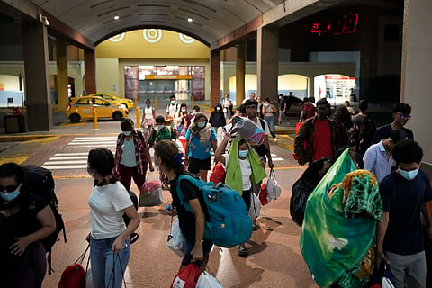 Migrants, mostly from Asian countries, arrived in Panama City on Saturday, March 8, 2025, after spending weeks in a Panamanian immigration camp following their deportation from the U.S. and being released on the condition that they leave the country within 30 days.