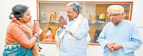 Chief Minister Siddaramaiah greets veteran actor Shabana Azmi, who was chosen for the Lifetime Achievement Award for her contribution to Indian cinema at the 16th Bengaluru International Film Festival, in Bengaluru on Monday. Azmi’s husband lyricist Javed Akhtar looks on