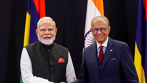 Prime Minister Narendra Modi and Mauritius Prime Minister Navinchandra Ramgoolam during exchange of MoUs, in Mauritius.