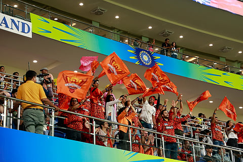 Fans enjoy an IPL match from the hospitality stands during the 2024 season