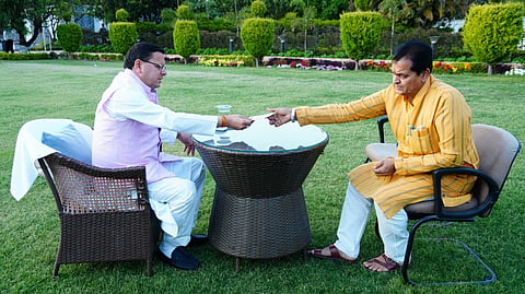 Uttarakhand Finance Minister Premchand Aggarwal submits his resignation letter to the Chief Minister Pushkar Singh Dhami.