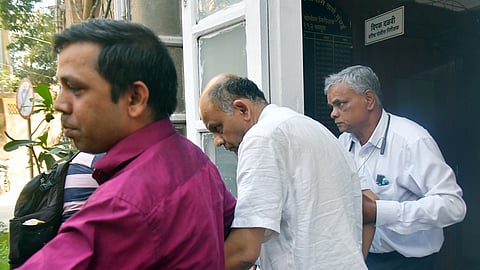 New India Co-operative Bank fraud case accused Hitesh Mehta (C) produced before Killa Court in Mumbai, February 16, 2025.