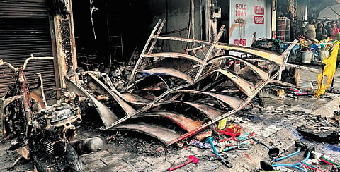 The shop that was gutted on Kathrikadavu Road on Saturday.