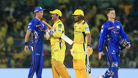 Mumbai Indians' Trent Boult, left, and Chennai Super Kings' Mahendra Singh Dhoni have a chat after Chennai Super Kings won the Indian Premier League cricket match against Mumbai Indians in Chennai, India, Sunday, March 23, 2025.