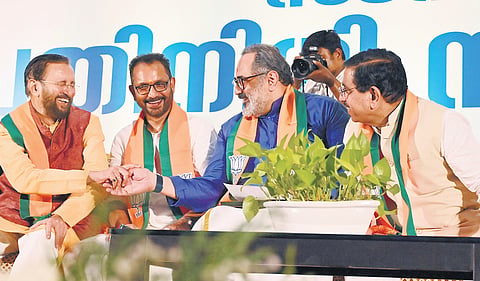 BJP’s newly appointed state president Rajeev Chandrasekhar with his predecessor K Surendran, senior party leader Prakash Javadekar and Union Minister Prahlad Joshi