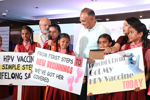 Health and Family Welfare Minister Dinesh Gundu Rao with students during the Cervical Cancer elimination movement from awareness to Action Cervical Cancer free Karnataka at a private hotel, in Bengaluru on Wednesday