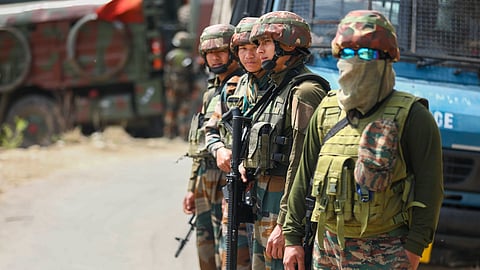 Security personnel near the site of an encounter which broke out between terrorists and security forces in Kathua, Thursday, March 27, 2025.