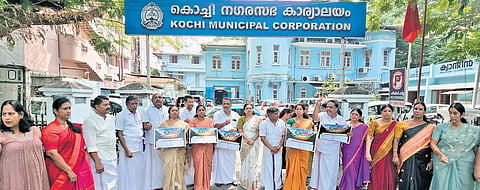 UDF councillors stage protest in front of the Kochi corporation office on Thursday after they walked out of the budget discussion