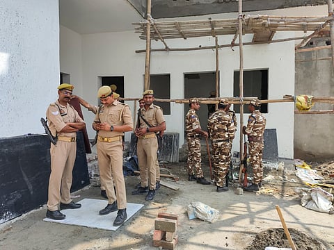 Police personnel at the site of Satyavrat Police Post being built in front of Shahi Jama Masjid, in Sambhal, Thursday, March 27, 2025.