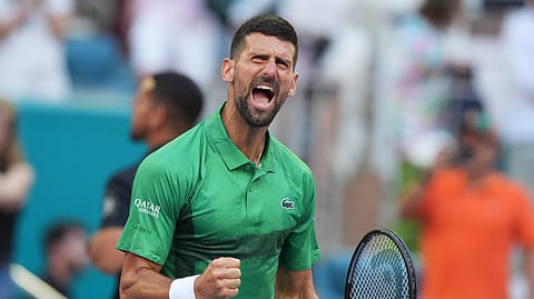 Novak Djokovic of Serbia celebrates after defeating Sebastian Korda during the Miami Open tennis tournament, Thursday, March 27, 2025, in Miami Gardens, Fla.