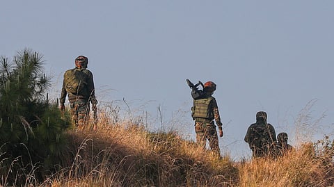 Security personnel during an anti-terrorist operation in a remote forested area, in Kathua.