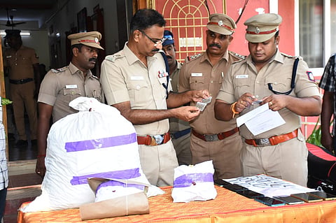 Cuddalore superintendent of police S Jeyakumar (second from left) inspecting the contraband seized during a raid near M Pudur TB hospital on Friday