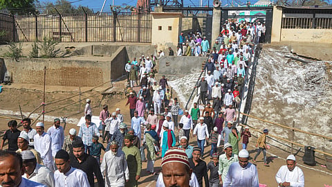 People leave after offering namaz during Eid-ul-Fitr festival, at Shahi Idgah mosque in Mathura, Uttar Pradesh, Monday, March 31, 2025.