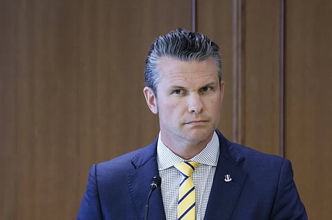 U.S. Secretary of Defense Pete Hegseth attends a joint news conference with Japan’s Defense Minister Gen Nakatani at the Ministry of Defense in Tokyo Sunday, March 30, 2025.