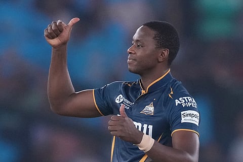 Gujarat Titans' Kagiso Rabada celebrates the dismissal of Punjab Kings' Prabhsimran Singh during an IPL match in Ahmedabad (Photo | AP)