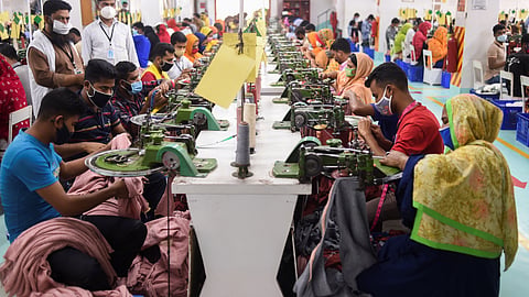 People work in a garment factory in Gazipur, Bangladesh.
