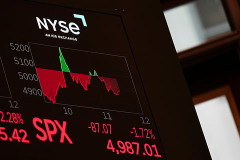 An electronic display shows financial information on the floor at the New York Stock Exchange in New York, Monday, April 7, 2025.