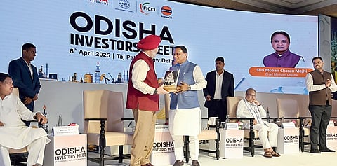CM Mohan Majhi with Union minister Hardeep Singh Puri during the Odisha Investors’ Meet in Delhi on Tuesday. Union ministers Dharmendra Pradhan, Jual Oram and state Industries minister SC Swain also present