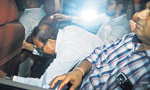 ED officials with
KN Ravichandran leave agency office at Nugambakkam after an inquiry