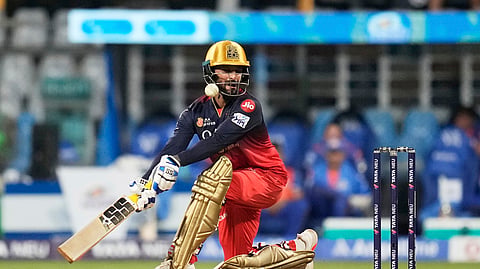 A ball hits Royal Challengers Bengaluru's captain Rajat Patidar during the Indian Premier League cricket match between Mumbai Indians and Royal Challengers Bengaluru at Wankhede Stadium in Mumbai, India, Monday, April 7, 2025.