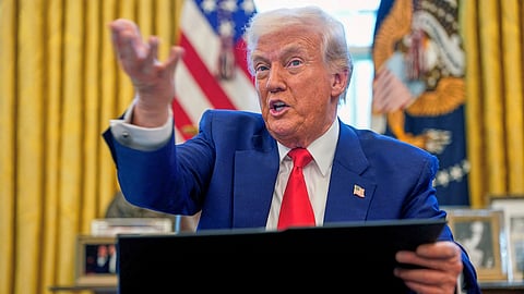 US President Donald Trump speaks as he signs executive orders in the Oval Office of the White House, Wednesday, April 9, 2025, in Washington.