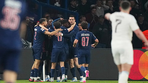 PSG players celebrate after Khvicha Kvaratskhelia scored their second goal during the Champions League quarterfinal first leg soccer match between Paris Saint-Germain and Aston Villa at Parc des Princes stadium in Paris, Wednesday, April 9, 2025.