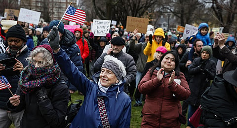Hundreds of demonstrators gather on Cambridge Common during a rally at the historic park in Cambridge, Mass., Saturday, April 12, 2025, calling on Harvard University to resist what organizers described as attempts by President Trump to influence the institution.