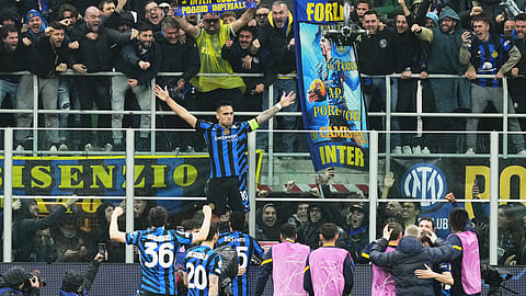 Inter Milan's Lautaro Martinez celebrates after scoring his side's opening goal during the Champions League quarterfinal second leg soccer match between Inter Milan and Bayern Munich at the San Siro stadium in Milan, Italy, Wednesday, April 16, 2025.