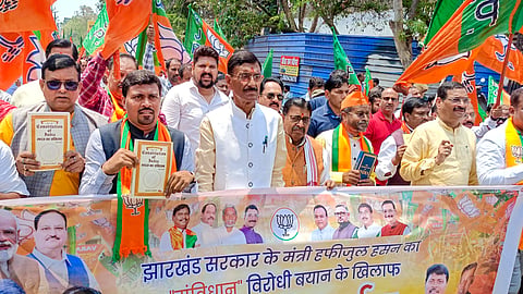 Union MoS for Defence Sanjay Seth with Jharkhand BJP leaders stages a protest against state Minister Hafizul Hasan over his alleged controversial remarks on Indian Constitution, in Ranchi, Thursday, April 17, 2025.