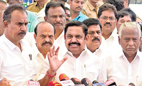 AIADMK leader EPS talking to reporters outside the Assembly on Monday