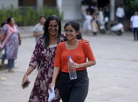 Students coming out of the exam centre with parents after KEAM engineering entrance exam on Wednesday at Kozhikode.